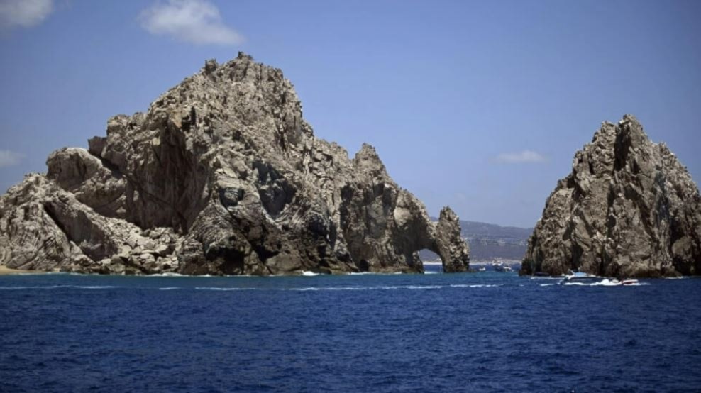 View of a rock formation at the Pacific Ocean in Cabo San Lucas, Baja California state, Mexico on August 4, 2023. (AFP)