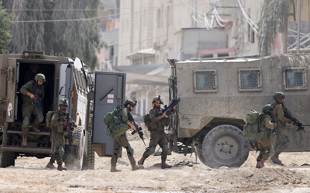 Israeli soldiers during a raid in the Nur Shams camp near the city of Tulkarem in the West Bank on August 28, 2024 (AFP)