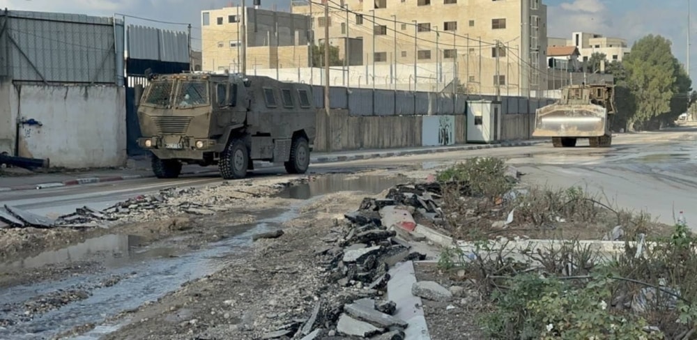 The Israeli occupation forces' military reinforcements enter the Nour Shams camp in Tulkarm, northern West Bank, Palestine, on August 28, 2024. (Palestinian media)