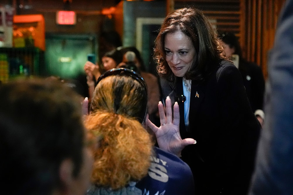 Democratic presidential nominee Vice President Kamala Harris talks as she visits SandFly Bar-B-Q in Savannah, Ga. on August 28, 2024. (AP)