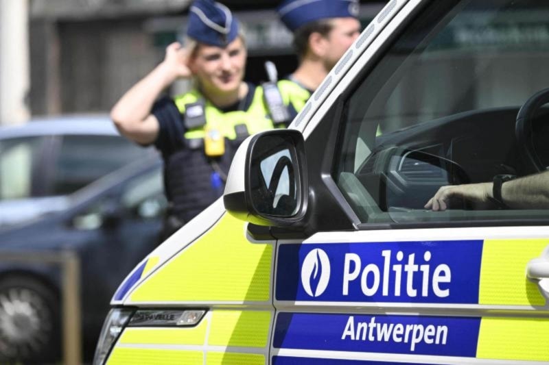 A file picture shows Belgian police officers stationed near the site of a terrorist incident at the Sint-Bernardsesteenweg in Hoboken, Antwerp. (AFP)