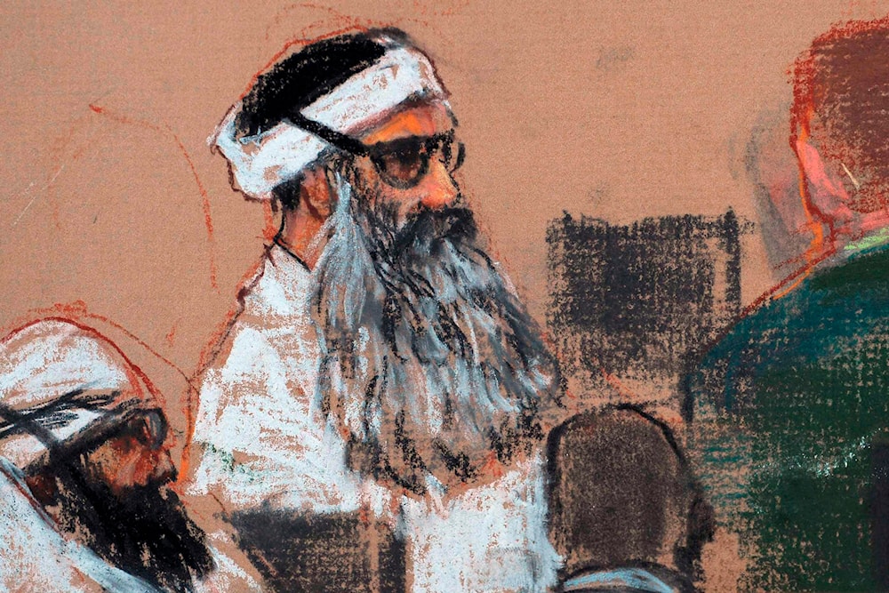 This Monday, Dec. 8, 2008 courtroom drawing by artist Janet Hamlin shows Khalid Sheikh Mohammed attending a pre-trial session at Guantanamo Bay Naval Base, Cuba. (AP)