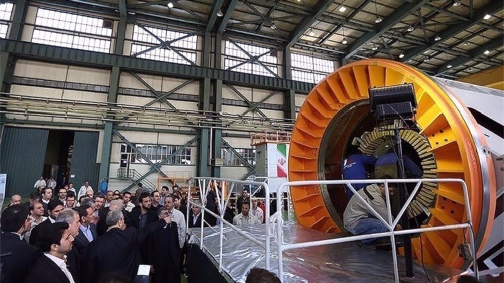 A power turbine is unveiled at an expo in Iran. (Press TV)