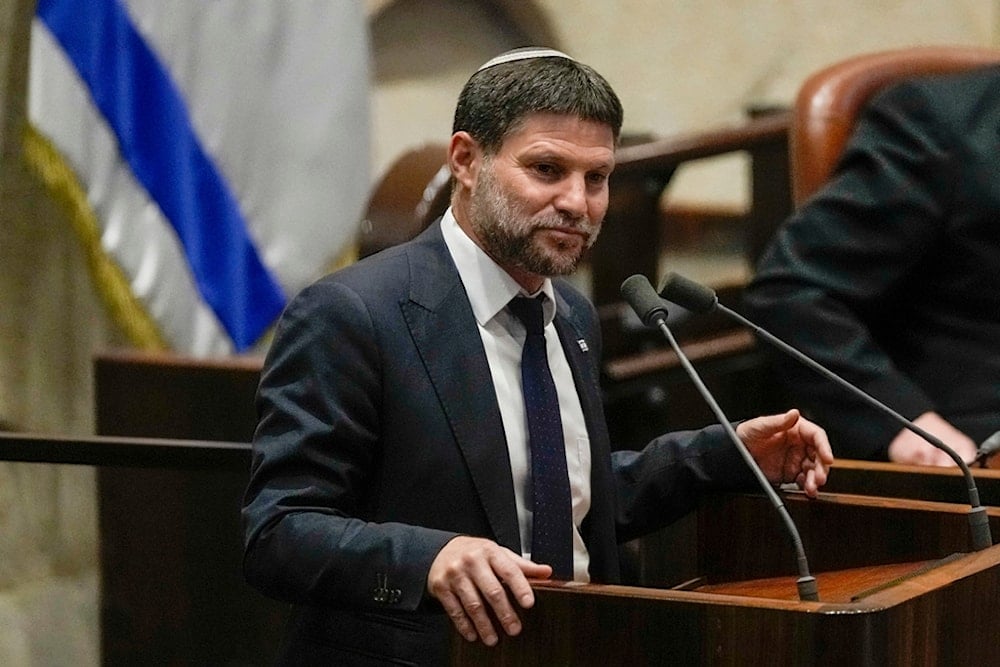 Israeli Finance Minister Bezalel Smotrich speaks at the Knesset in occupied al-Quds, on July 10, 2023. (AP)