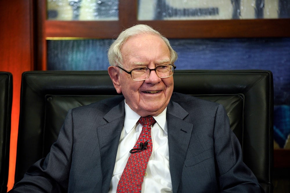 Berkshire Hathaway Chairman and CEO Warren Buffett smiles during an interview, May 7, 2018, in Omaha, Nebraska (AP)