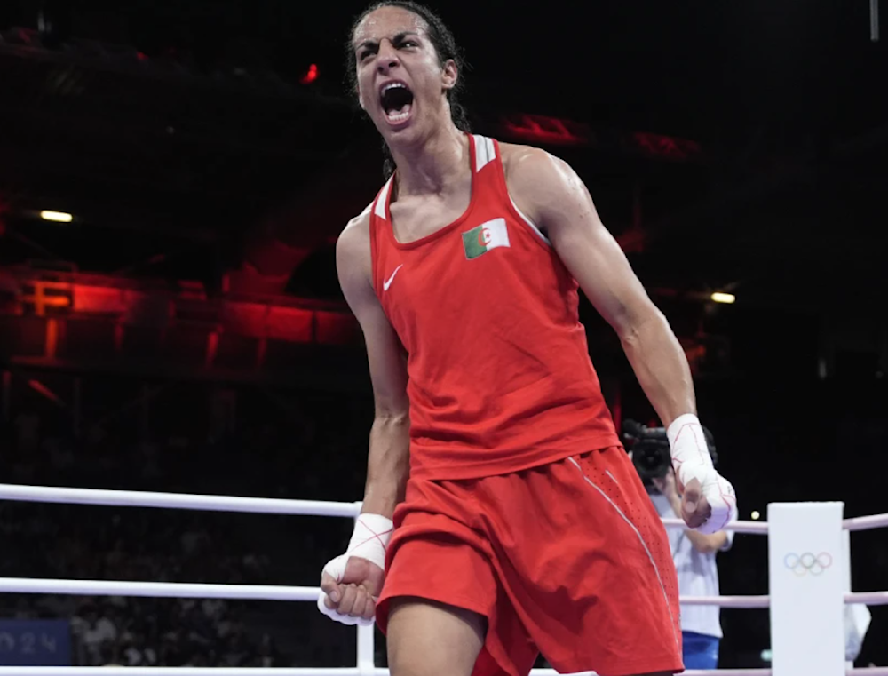 Algeria's Imane Khelif celebrates after defeating Hungary's Anna Hamori in their women's 66kg quarterfinal boxing match at the 2024 Summer Olympics on August 3, 2024. (AP)