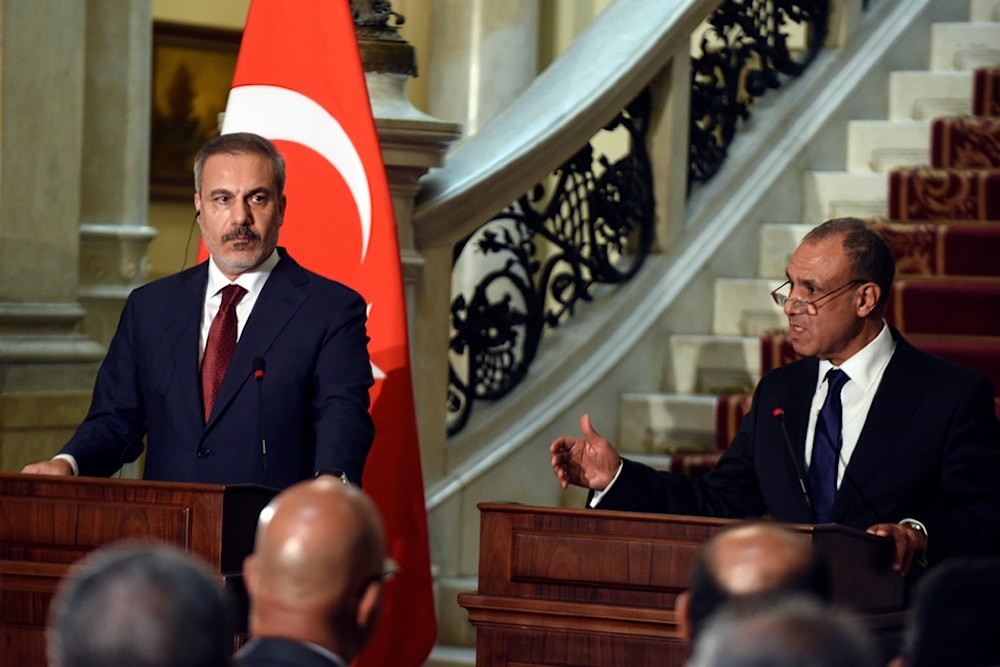 Egyptian Foreign Minister Badr Abdelatty, right, speaks during a press conference with his Turkish counterpart Hakan Fidan, left, at Tahrir Palace in Cairo, Egypt, Monday, Aug. 5, 2024. (AP)