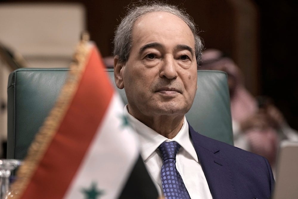 Syria's Foreign Minister Faisal Mekdad chairs his delegation during the Arab-Japanese political dialogue at the Arab League headquarters in Cairo, Egypt, Tuesday, Sept. 5, 2023. (AP)