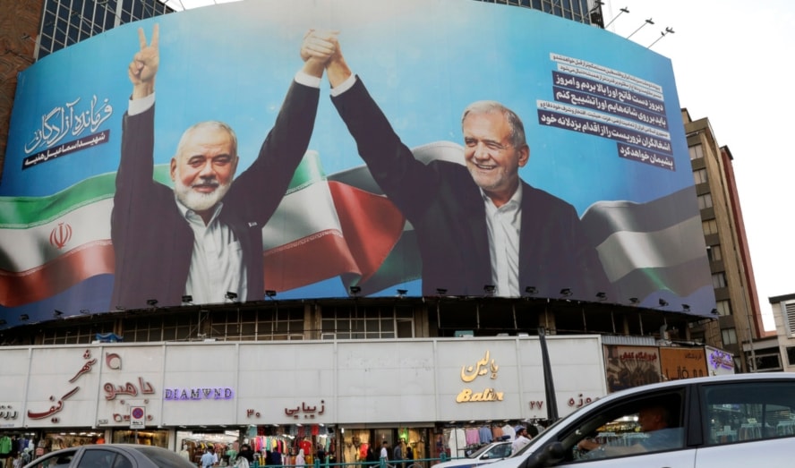 A banner showing the late Hamas leader Ismail Haniyeh, left, joining hands with Iranian President Masoud Pezeshkian, in a square in downtown Tehran, Iran, Monday, Aug. 5, 2024. (AP)