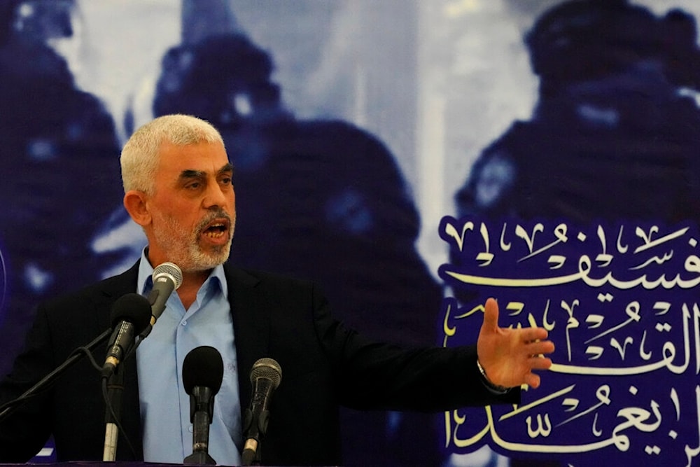 Yahya Sinwar, head of Hamas in Gaza, delivers a speech during a meeting with people at a hall on the sea side of Gaza City, Saturday, April 30, 2022. (AP)