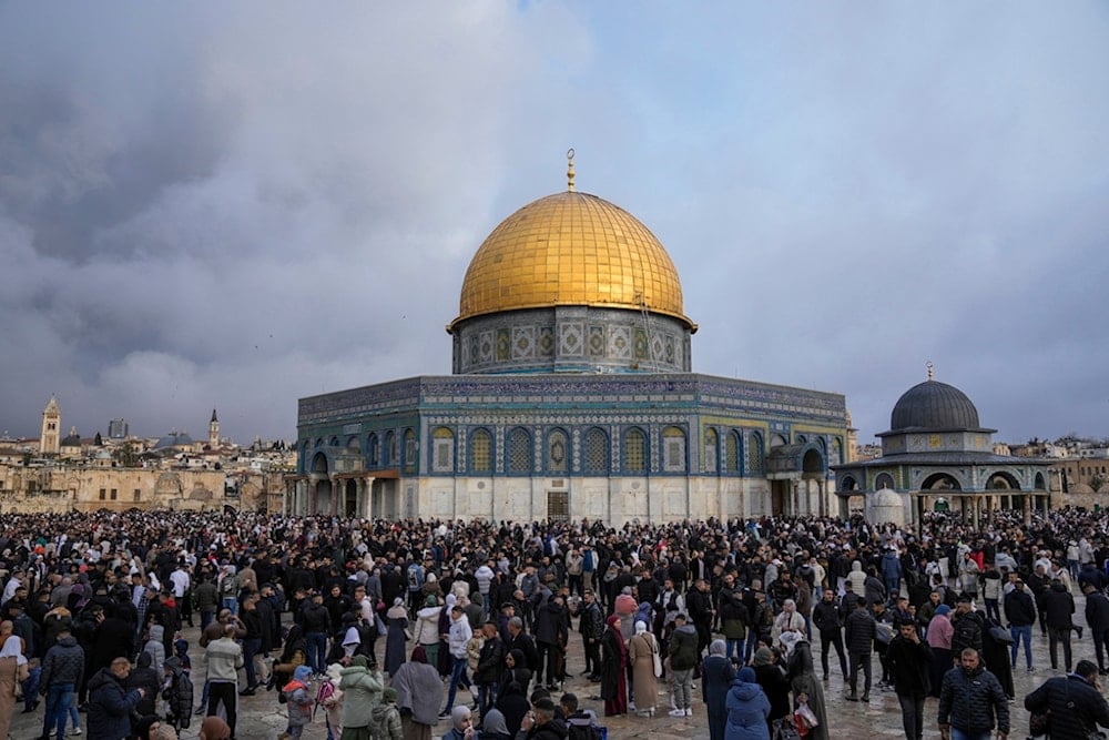 Palestinians gather for Eid al-Fitr prayers by the Dome of the Rock shrine in the Al Aqsa Mosque compound in al-Quds Old City, Wednesday, April 10, 2024. (AP)