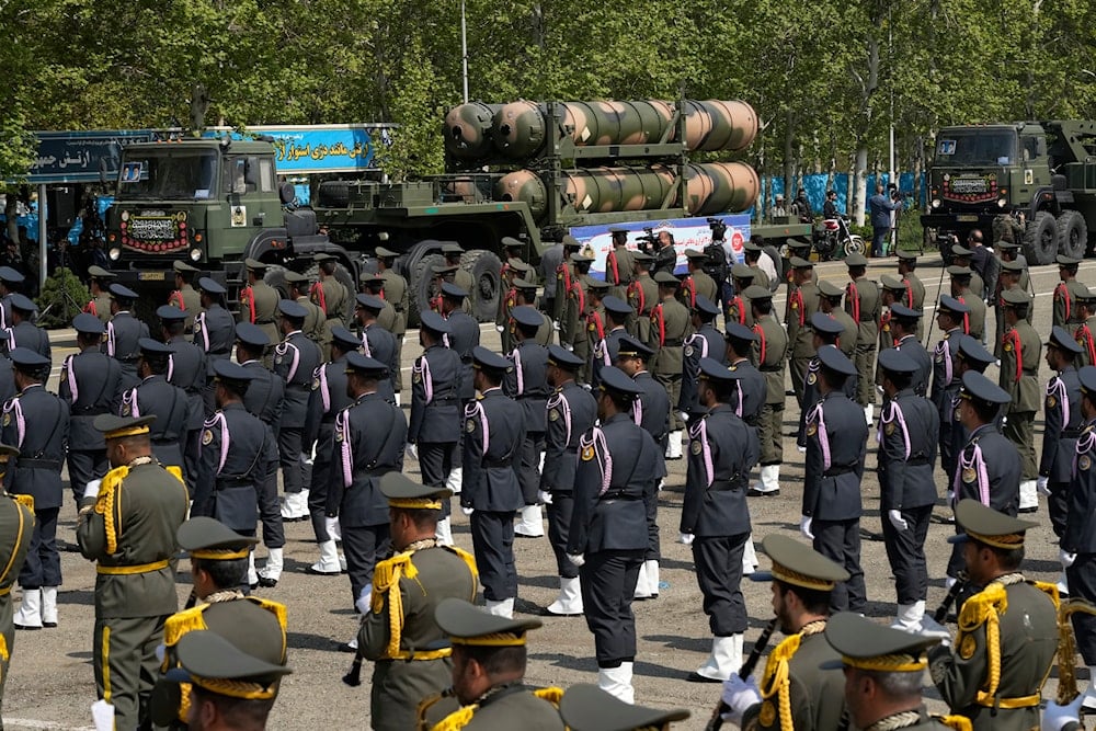 A Russian-made S-300 air defense system is carried on a truck during Army Day parade at a military base in northern Tehran, Iran, Wednesday, April 17, 2024 (AP)