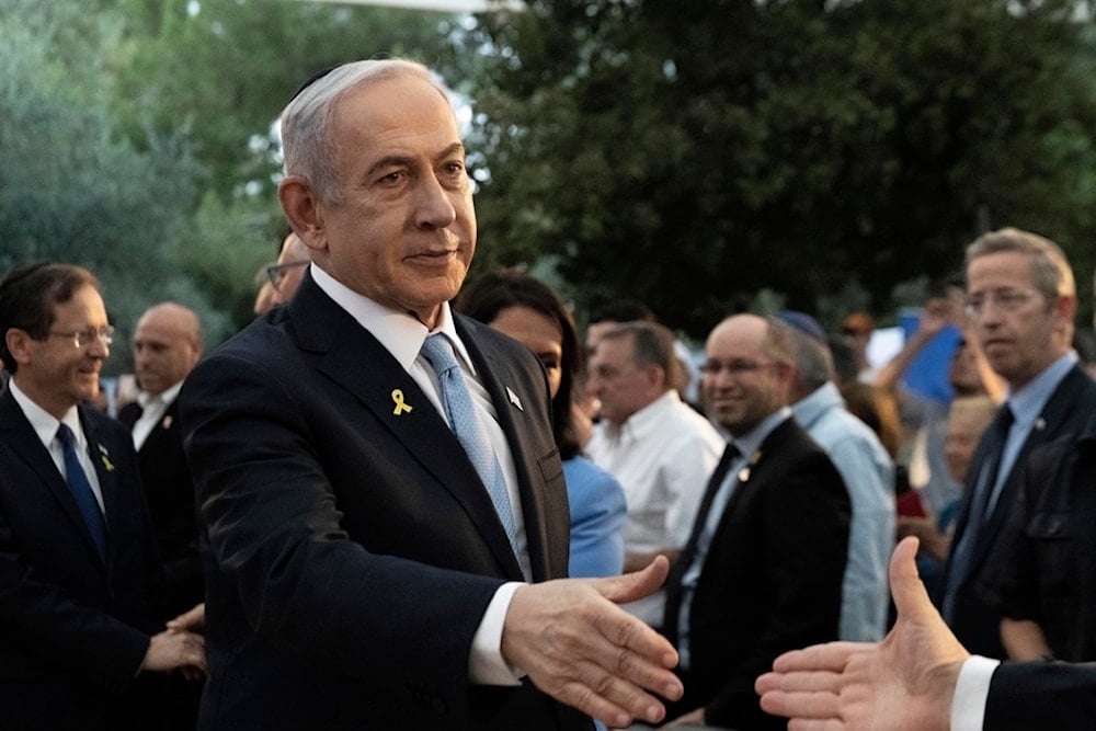 Israeli Prime Minister Benjamin Netanyahu attends the state memorial for Ze'ev Jabotinsky, at Mount Herzl Military Cemetery in al-Quds, Sunday, Aug. 4, 2024 (AP)