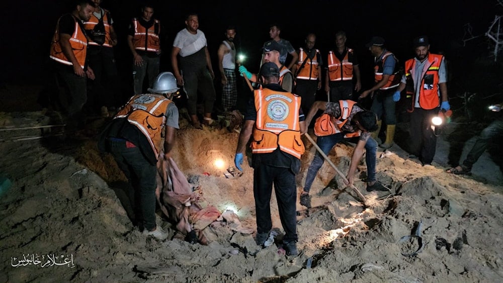  A Palestinian civil defense team conducts a search and rescue operation after the Israeli occupation bombed tents with advanced missiles on September 10, 2024. (Khan Younis media)