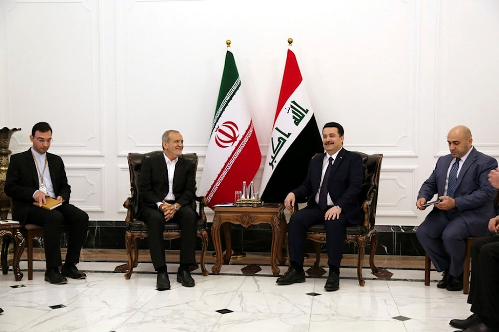 Iranian President Masoud Pezeshkian, center left, and Iraqi Prime Minister Mohammed Shia al-Sudani, center right, meet at the government palace in Baghdad, Iraq, Wednesday, September 11, 2024 (AP)