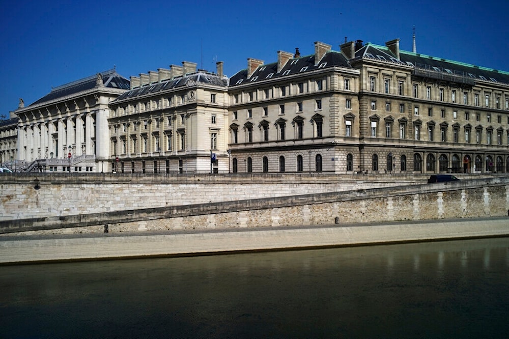 View of the deserted Seine river banks along the Palais de Justice courthouse in Paris, Wednesday, April 8, 2020. (AP)