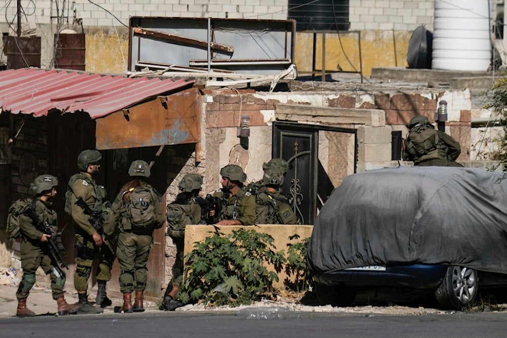 Israeli occupation forces soldiers are seen during an army raid in Tubas, West Bank, on Wednesday, September 11, 2024 (AP)