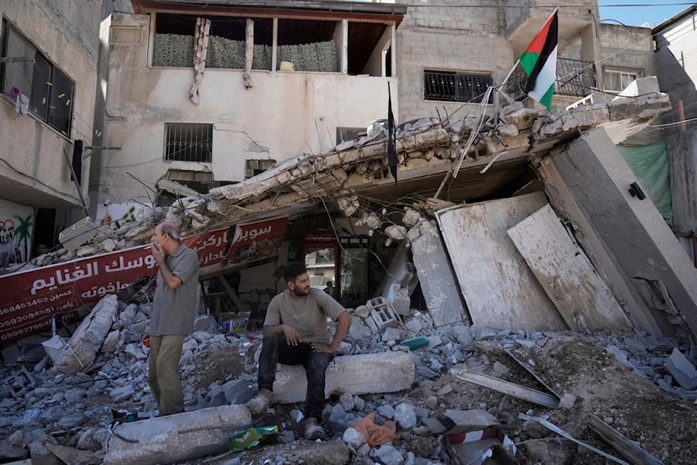 People inspect the destruction following an Israeli forces raid in Tulkarem, West Bank, Palestine, Sept. 11, 2024. (AP)