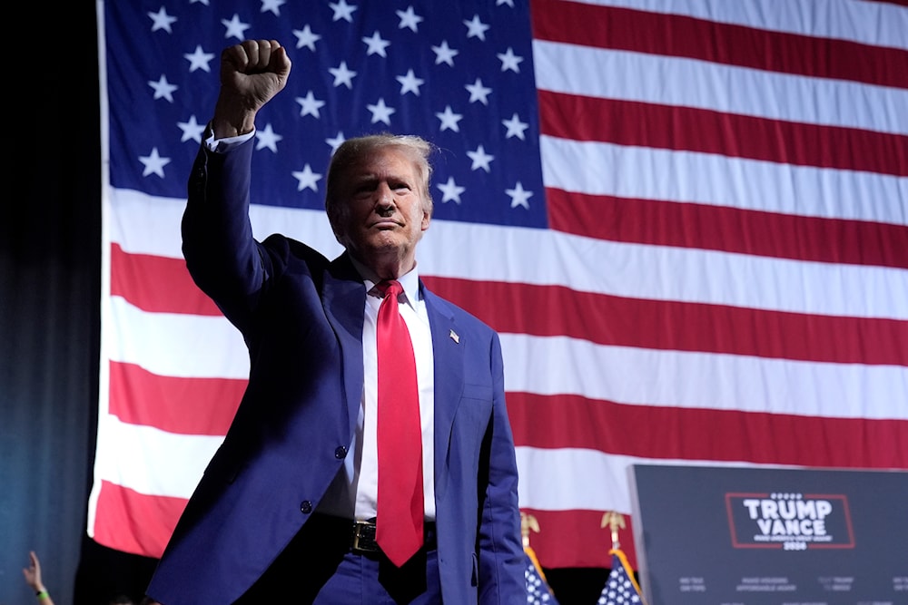 Republican presidential nominee former President Donald Trump gestures as he departs after speaks at a campaign event at the Linda Ronstadt Music Hall, on September 12, 2024, in Tucson, Ariz. (AP)