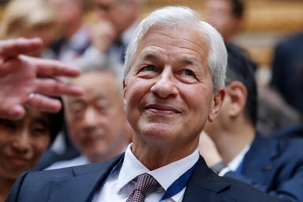 CEO of Chase Jamie Dimon looks on during the seventh 