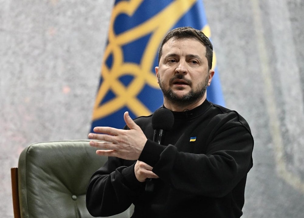 Ukrainian President Volodymyr Zelensky gestures as he gives a press conference in Kiev on February 24, 2023, on the first anniversary of the Russian operation in Ukraine (AFP)