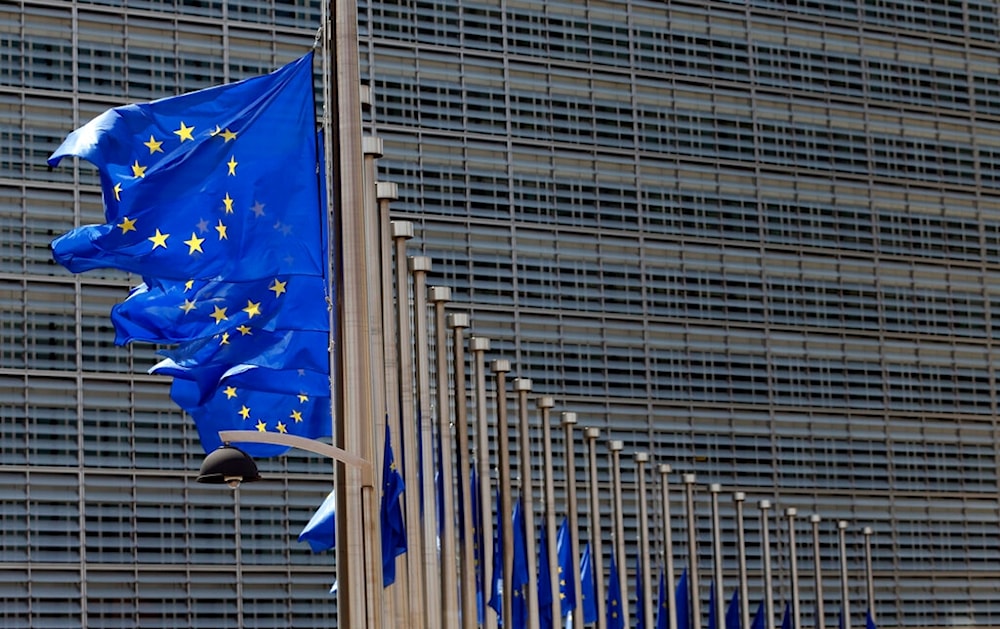 European Union flags set of half staff outside the European Commission headquarters in Brussels, Belgium, Friday, July 15, 2016. (AP)