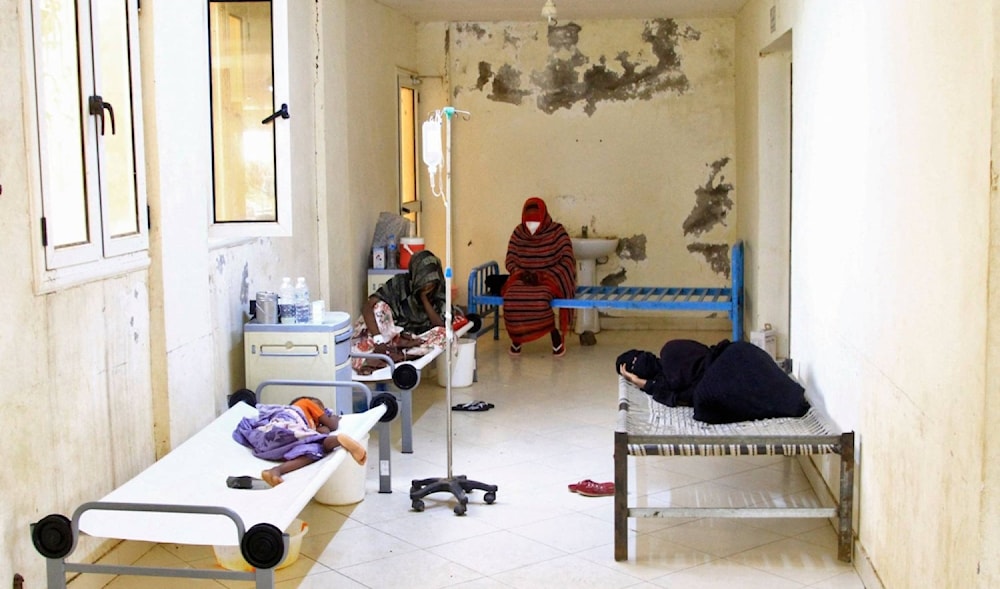 Patients suffering from cholera receive treatment at a rural isolation center in Wad Al-Hilu in Kassala state in eastern Sudan, on August 17, 2024. (AFP)