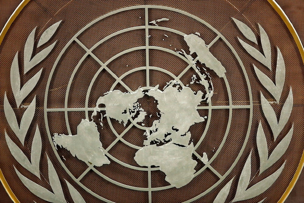 The logo of the United Nations is seen at the General Assembly hall at U.N. headquarters, Tuesday, Sept. 21, 2021. (AP)