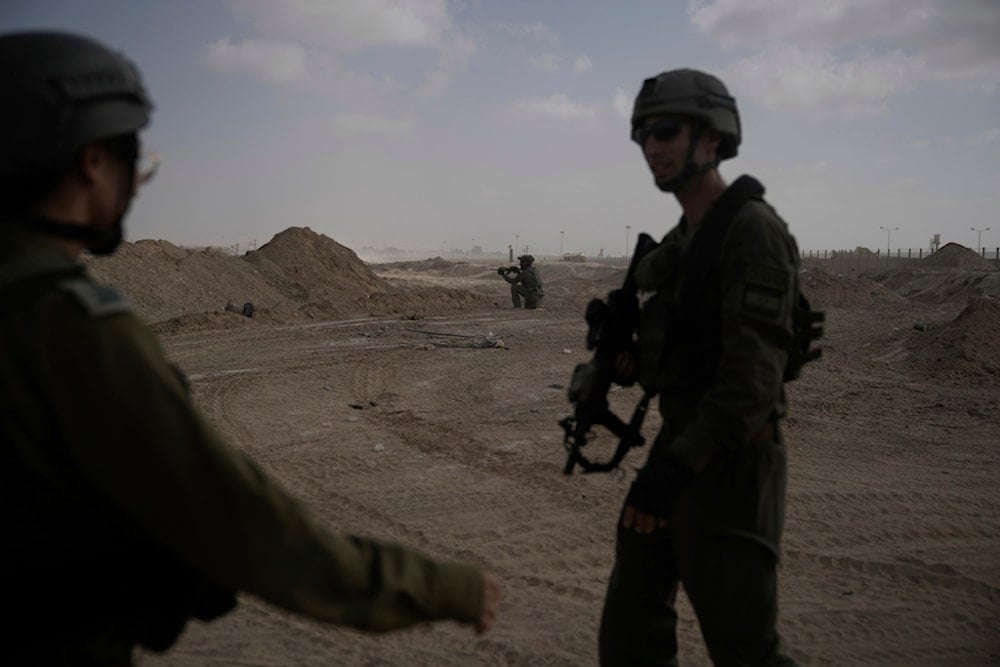 Israeli occupation soldiers take up positions next to the Philadelphi Corridor along the border with Egypt, in the Gaza Strip, Palestine, Sept. 13, 2024. (AP)