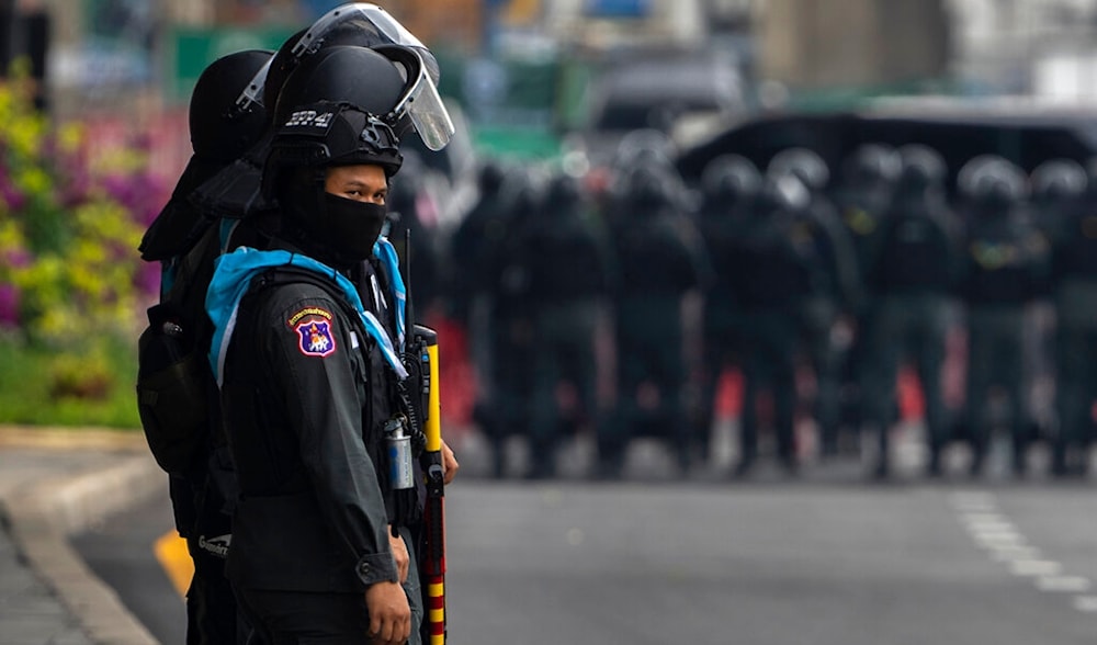 Police stand guard on a closed-off street near the venue of the Asia-Pacific Economic Cooperation APEC summit, in Bangkok, Thailand, November 18, 2022. (AP)