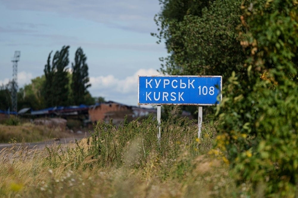 A plate with a sign Kursk 108 km is seen on the Russian-Ukrainian border in the Sumy region, Ukraine Tuesday, August 13,2024. (AP)