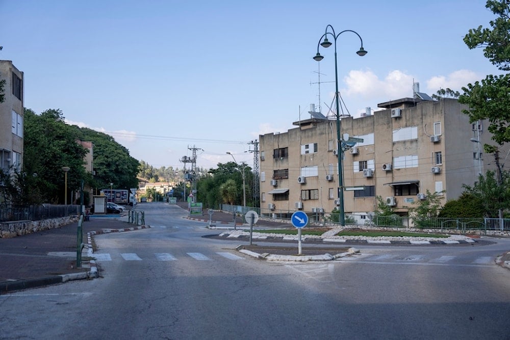 An empty street in Kiryat Shmona, a city located next to border with Lebanon, northern occupied Palestine, Thursday, August 29, 2024 (AP)