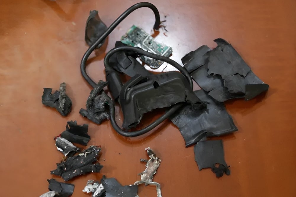 The remains of exploded Israeli-rigged pagers on display at an undisclosed location in September 2024 (AFP)