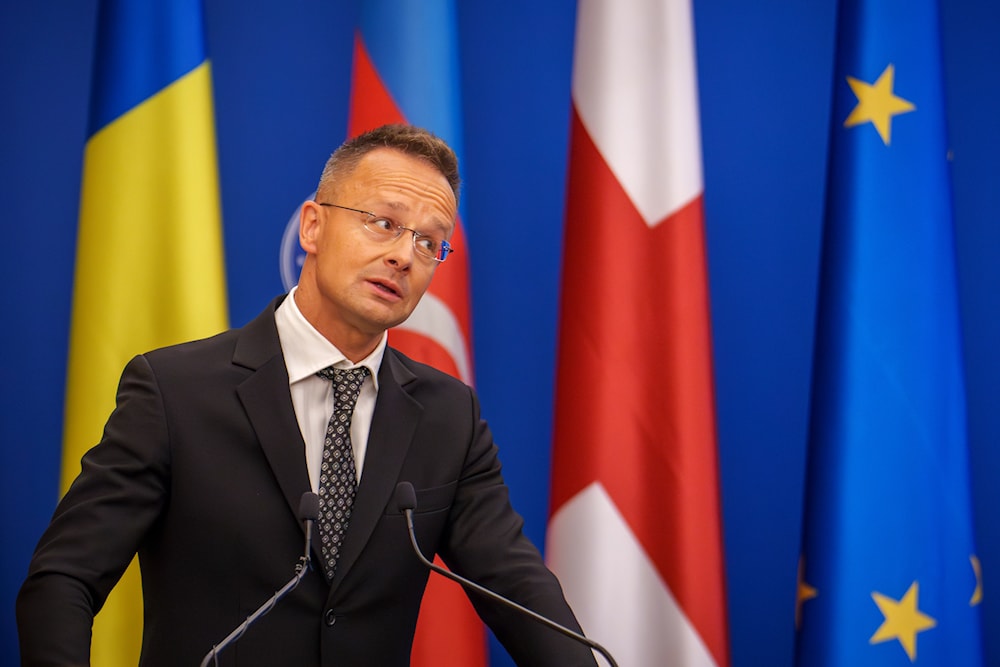 Hungary's Foreign Minister Peter Szijjarto grimaces during a joint press conference in Bucharest, Romania, on September 3, 2024. (AP)