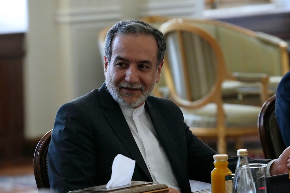 Iranian Foreign Minister Abbas Araghchi attends a meeting with Qatari Prime Minister and Foreign Minister Sheikh Mohammed bin Abdulrahman Al Thani, in Tehran, Iran, on August 26, 2024. (AP)