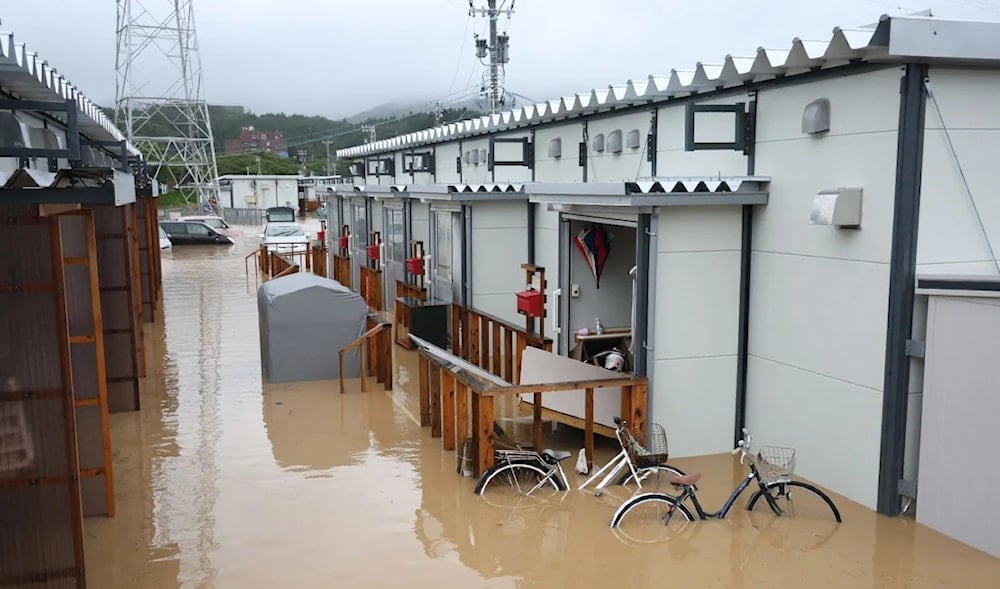 Heavy rainfall triggers landslides, floods in Japan's quake-hit region