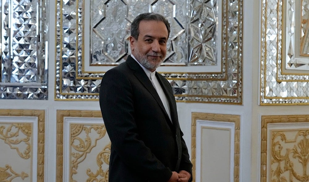 Iranian Foreign Minister Abbas Araghchi prior to welcoming Qatari Prime Minister and Foreign Minister Sheikh Mohammed bin Abdulrahman Al Thani for their meeting, in Tehran, Iran, Monday, Aug. 26, 2024. 