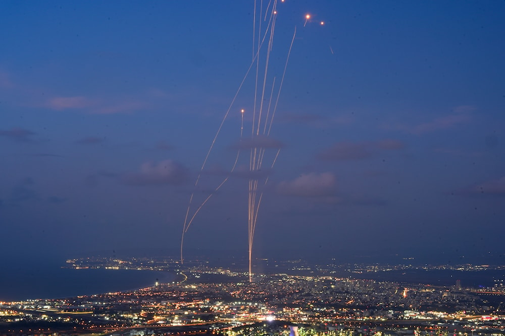 Israeli Iron Dome air defense system fires to intercept rockets that were launched from Lebanon, as seen from Haifa, northern Israel, Monday, Sept. 23, 2024. (AP)