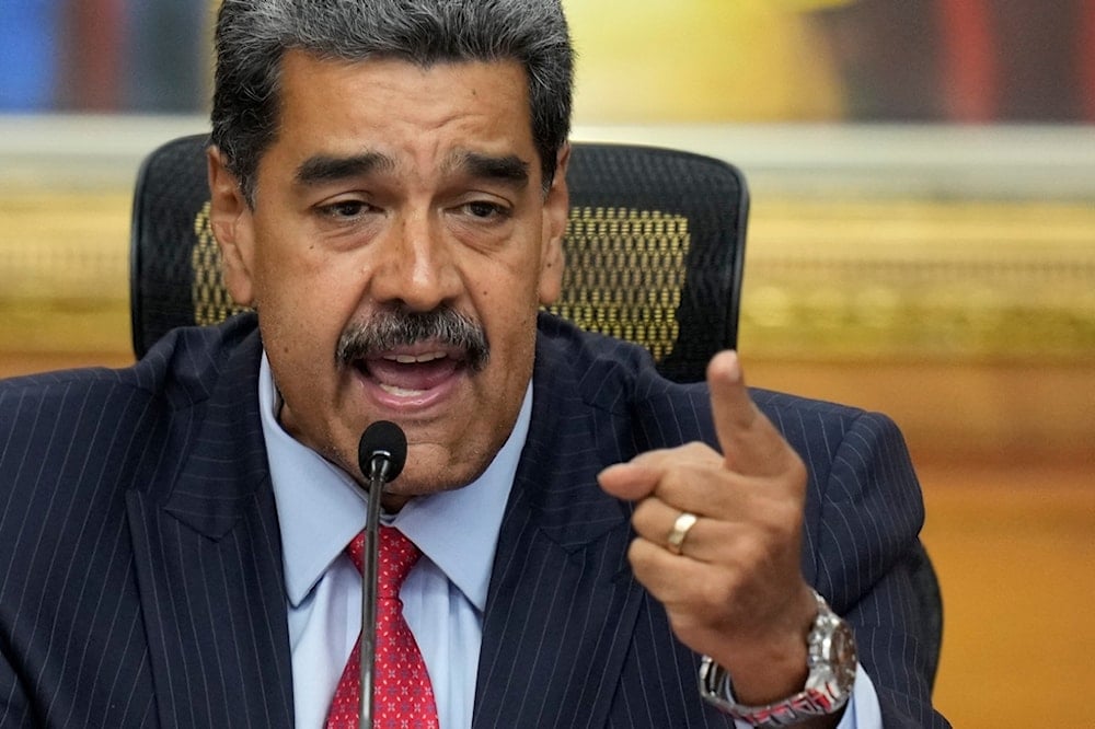 Venezuelan President Nicolas Maduro holds a news conference at the Miraflores presidential palace in Caracas, Venezuela, July 31, 2024. (AP)