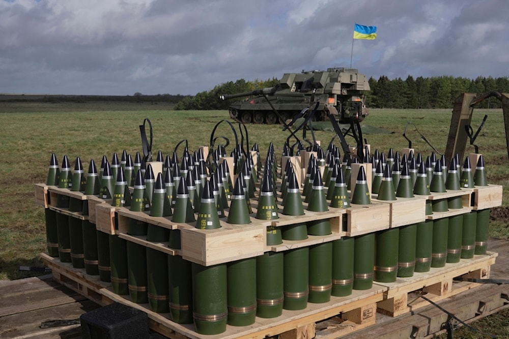 Ammunition are placed as Ukrainian soldiers take part in a military exercise at a military training camp in an undisclosed location in England, on March 24, 2023. (AP)