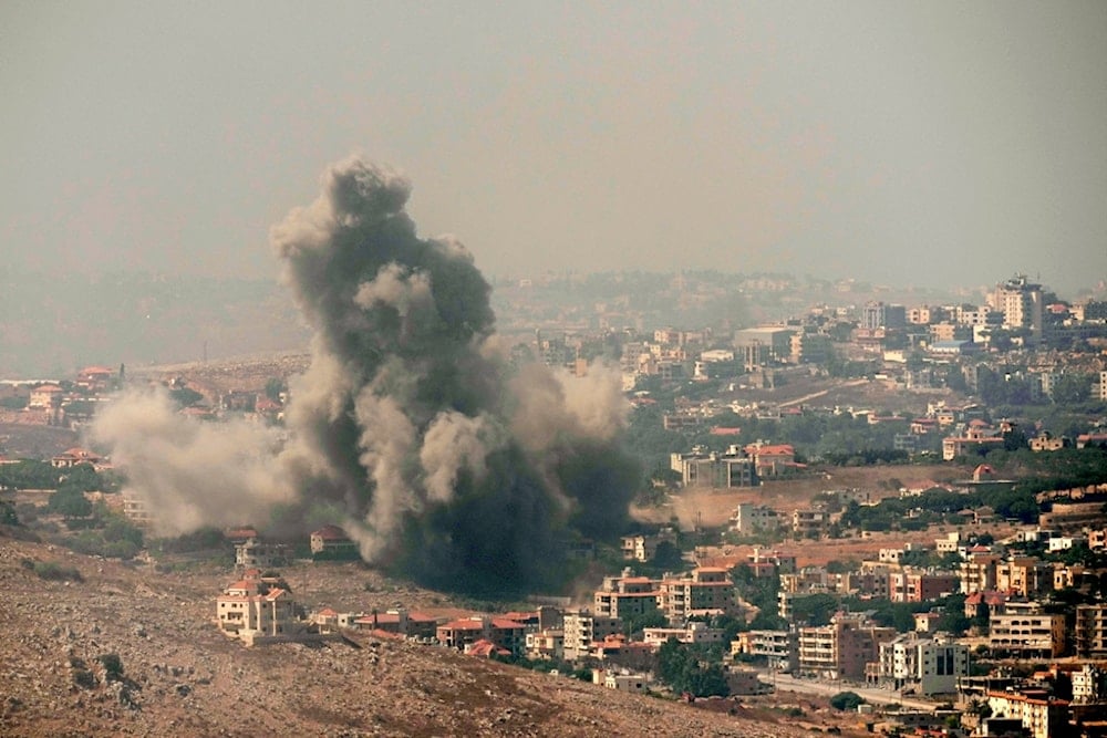 Smoke rises from Israeli airstrikes in the southern village of Kfar Rouman, seen from Marjayoun, south Lebanon, Wednesday, September 25, 2024 (AP)