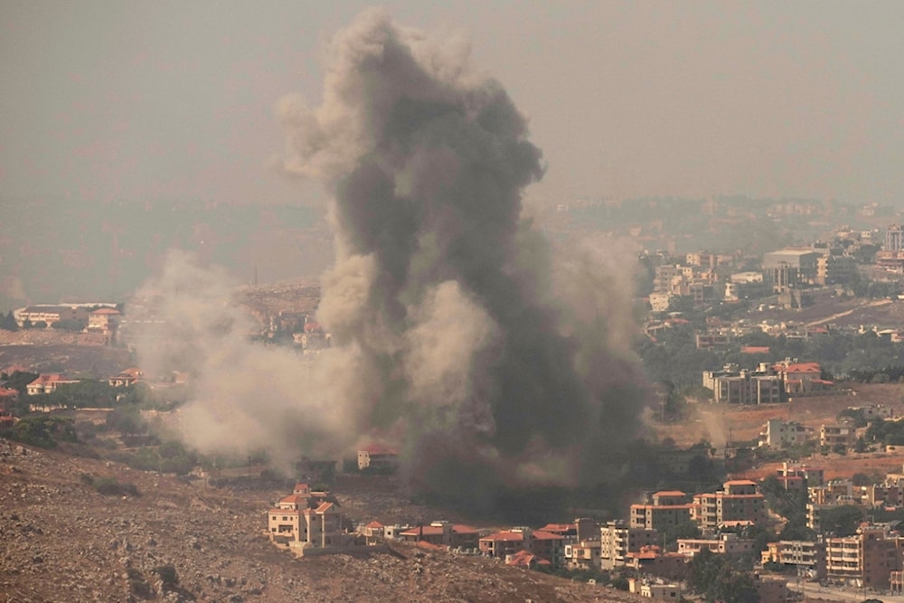 Smoke rises from Israeli airstrikes in the southern village of Kfar Rouman, seen from Marjayoun, south Lebanon, Wednesday, September 25, 2024 (AP)