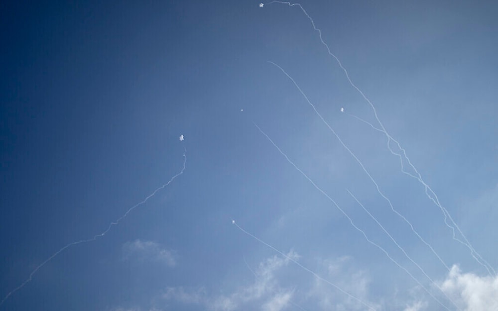 The Iron Dome air defense system fires to intercept rockets launched from Lebanon, as seen from Haifa, Sept. 27, 2024. (AP) )