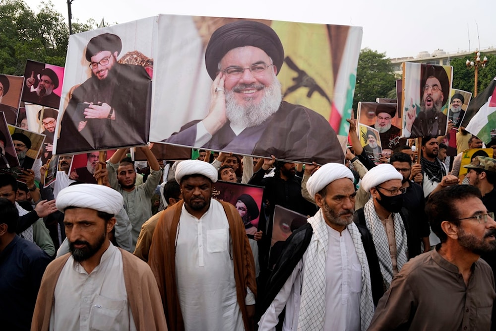 Shiite Muslims shout anti-Zionist and anti-US slogans during a protest against the martyrdom of Hezbollah leader Hassan Nasrallah, Sunday, Sept. 29, 2024, in Lahore, Pakistan. (AP)