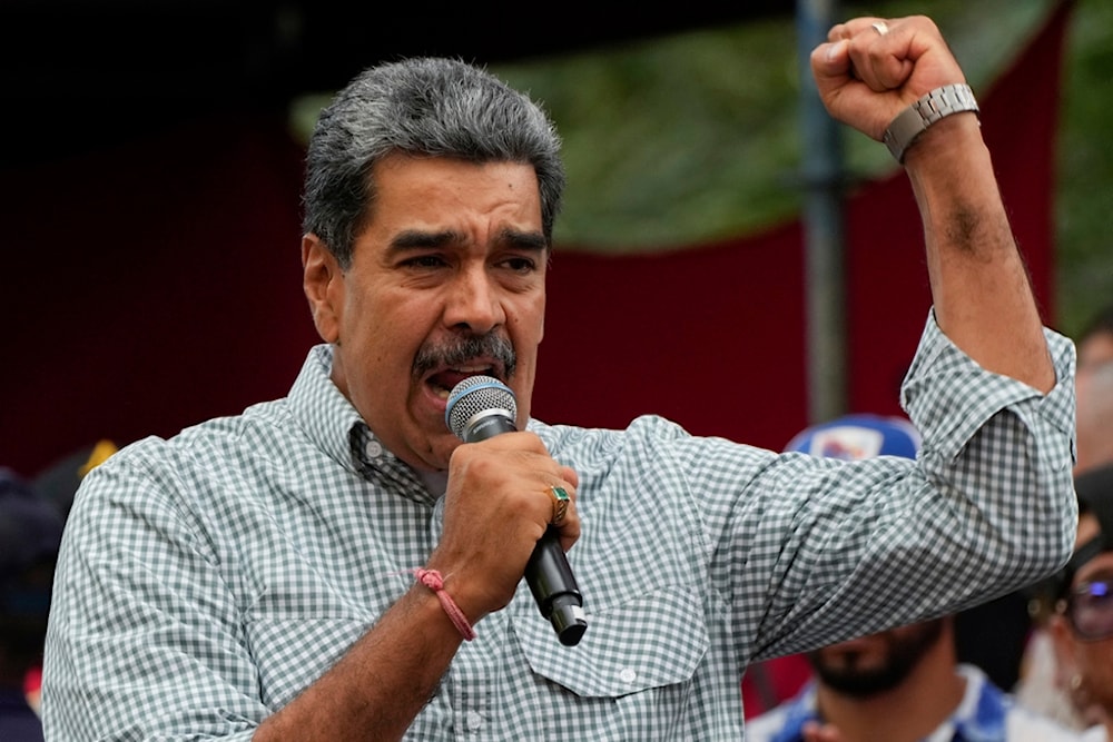 Venezuela's President Nicolas Maduro makes a public address at the presidential palace in Caracas, Venezuela, August 28, 2024 (AP)