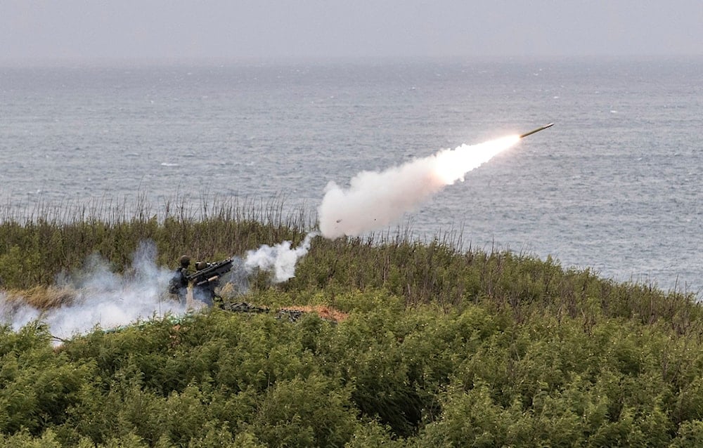 In this photo released by Taiwan Military News Agency, Taiwanese soldiers launch a missile from a US made FIM 92 Stinger man-portable air defense system during the annual Han Kuang military exercises in Penghu County, Taiwan, July 24, 2024. (AP)