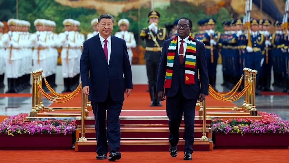 Chinese leader Xi Jinping and Zimbabwe's President Emmerson Mnangagwa review an honor guard during a welcome ceremony at the Great Hall of the People in Beijing ahead of the Forum on China and Africa Cooperation, on September 2, 2024. (AP)