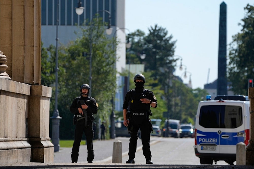 Police officers stand guard after police fired shots at a suspicious person near the Israeli Consulate and a museum in Munich, Germany, Thursday, September 5, 2024 (AP)