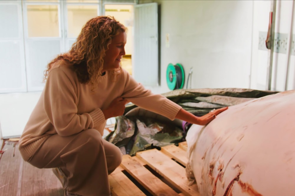 egina Haug, founder of OneWhale, with Hvaldimir's body on September 4, 2024. (OneWhale.org)