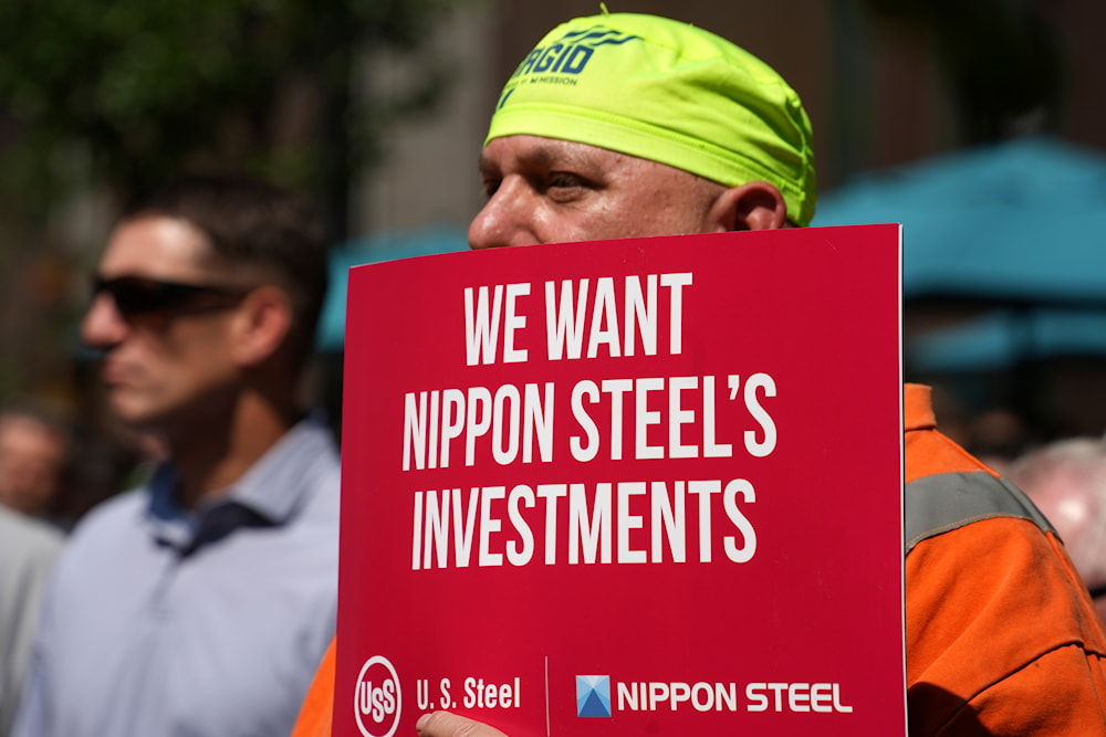 A rally by U.S. Steel employees is held outside the United Steel Tower in downtown Pittsburgh to display their support for the transaction with Nippon Steel on September 4, 2024. (AP)